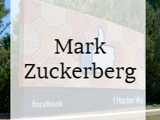 A graphic logo displaying Mark Zuckerberg