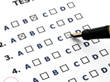 Photo of an Aptitude Test and Pen
