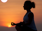 Photo of someone meditating representing personal values and behaviour
